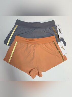 NWT 2 Rhône Women's peach and gray Athletic Shorts with Gold Side Stripe size S